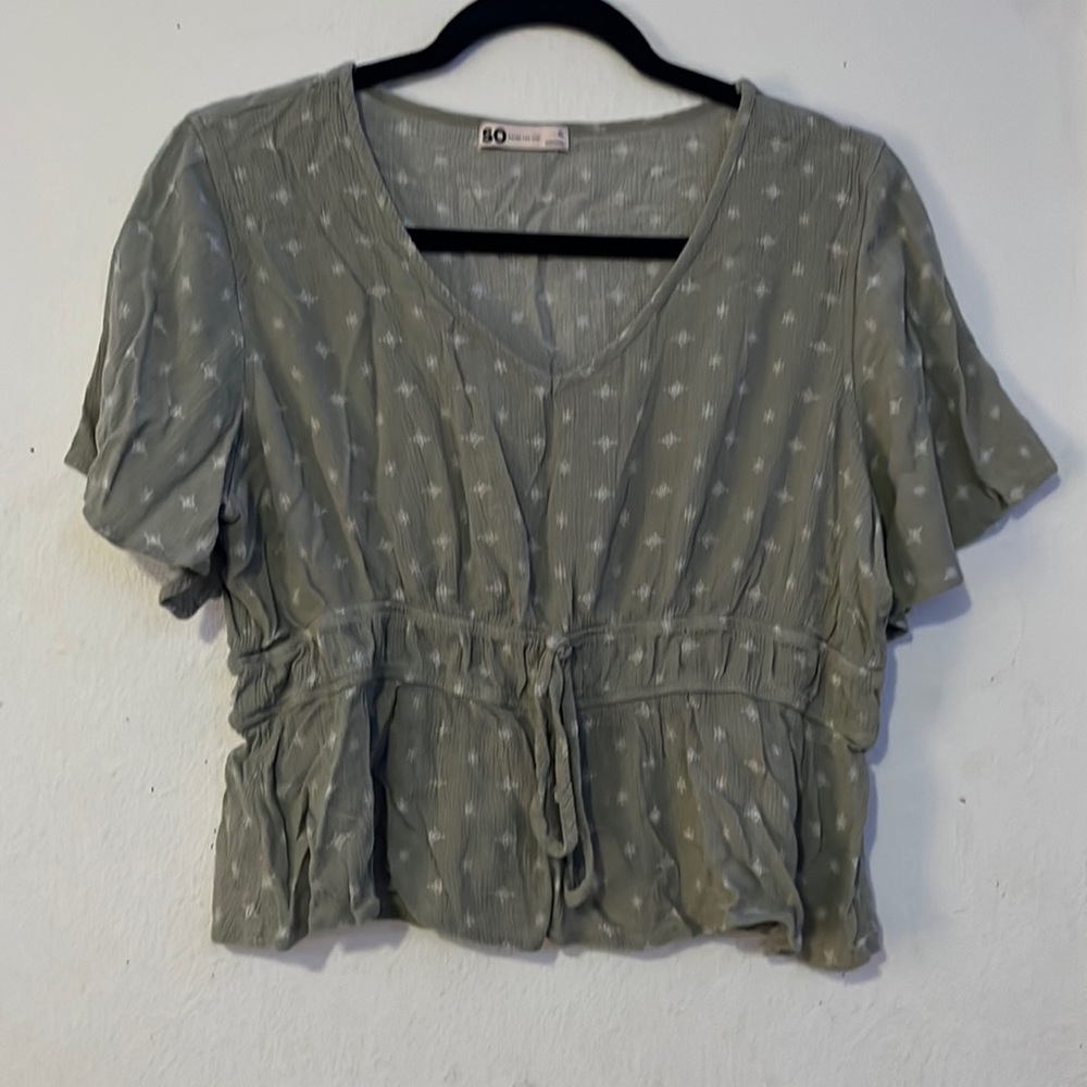 Light green and white womans blouse